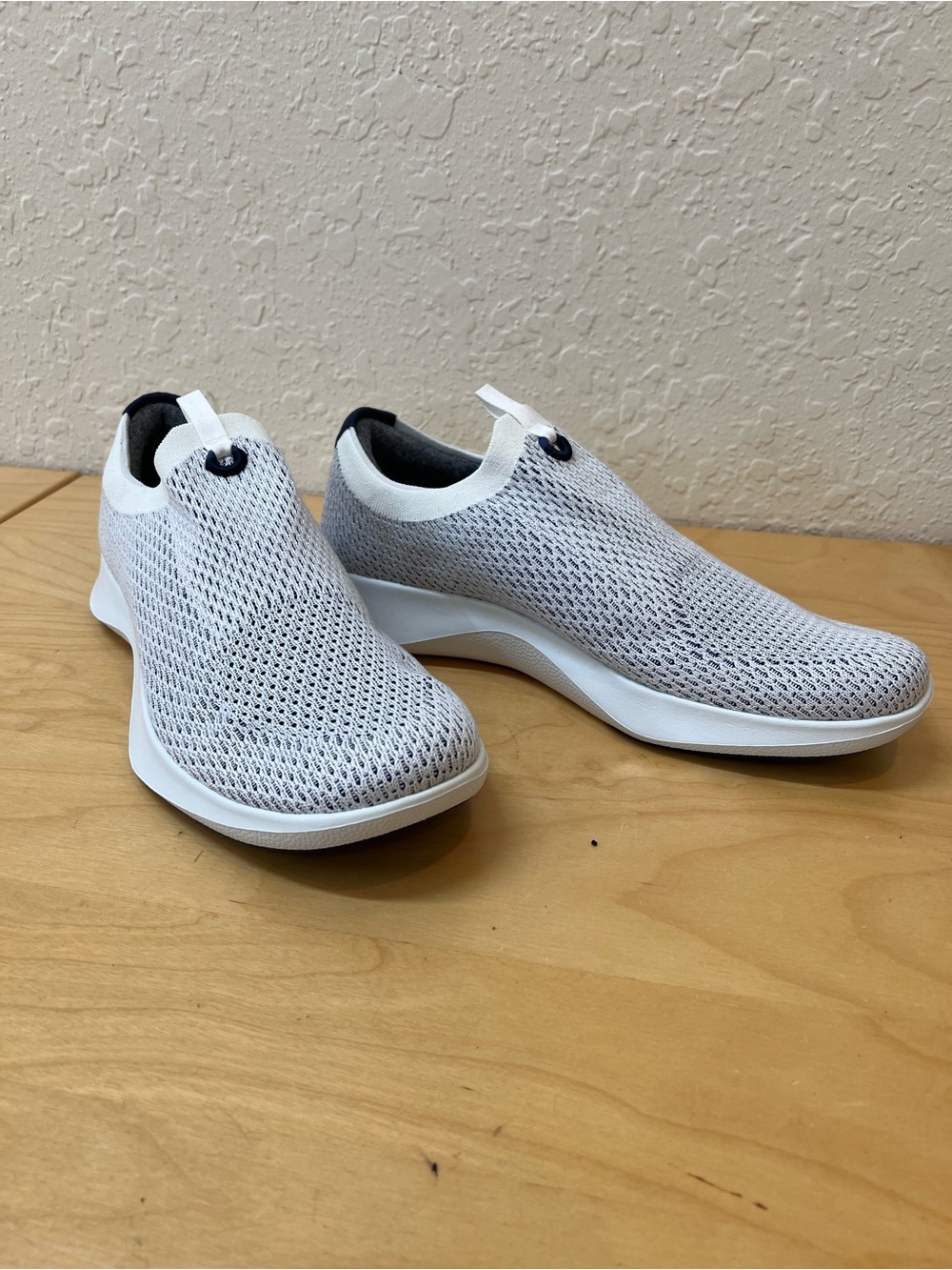 allbirds Men's US 13,5 Slip-On Knit Sneakers - White and navy.